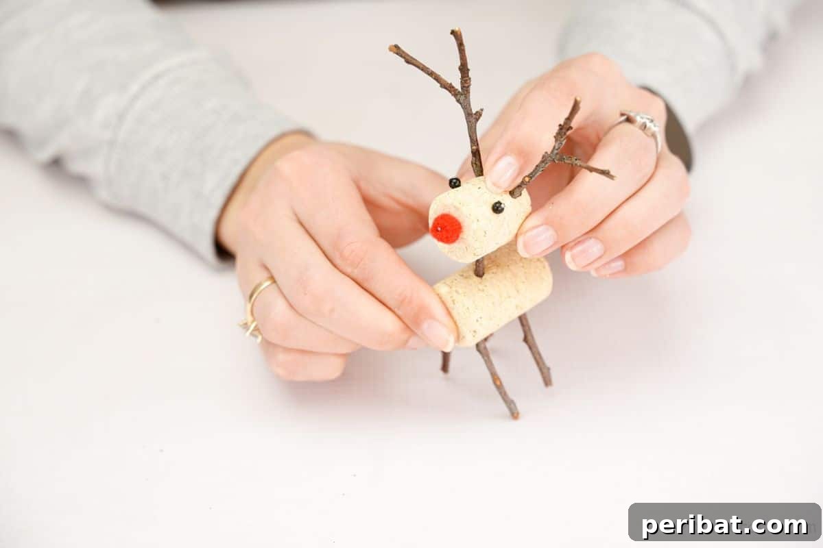 Whimsical Wine Cork Reindeer Ornament 13 adding cork head to cork body for reindeer