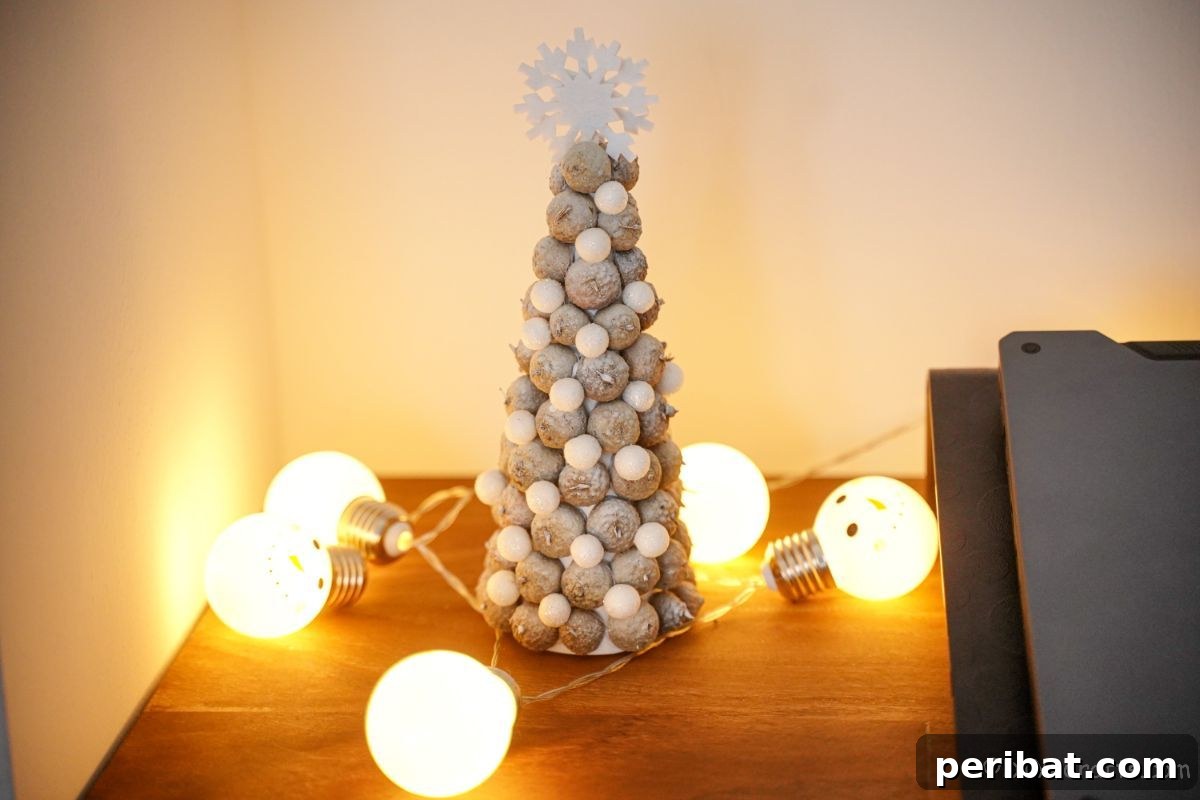 white mini tree on side table with lights