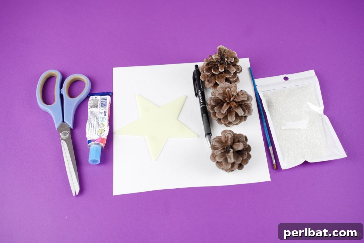 white paper with pinecones and blue scissors on purple table