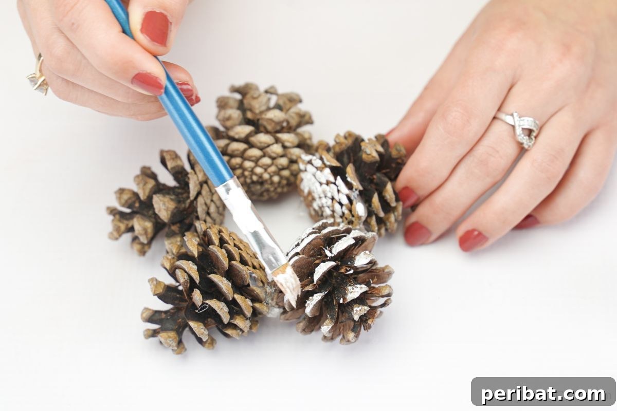 Glistening Bead-Adorned Pinecone Star 9 hand painting star shaped pinecone ornament with white paint