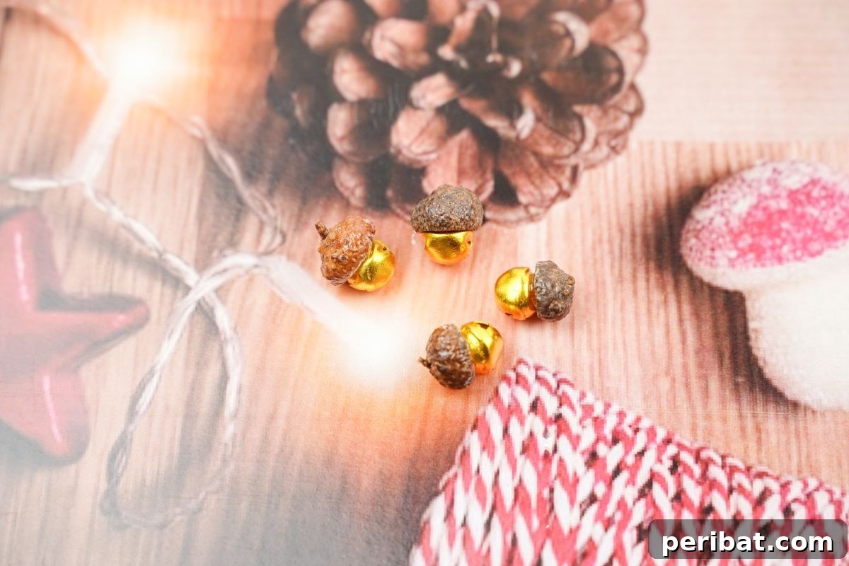 Array of acorn cap jingle bells with shimmering gold bells, beautifully arranged on holiday scrapbook paper