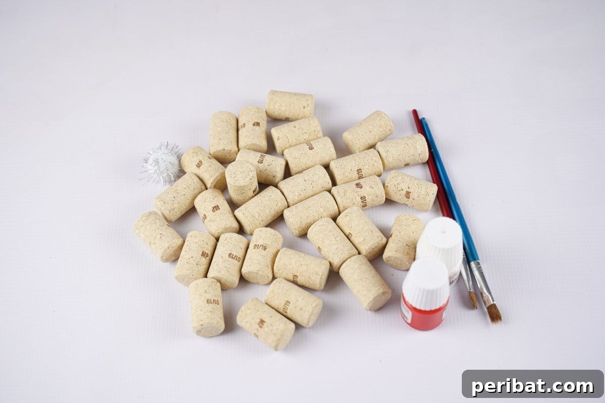 A neat stack of wine corks, bottles of red and white paint, and a paintbrush are arranged on a clean white table, ready for a DIY project.