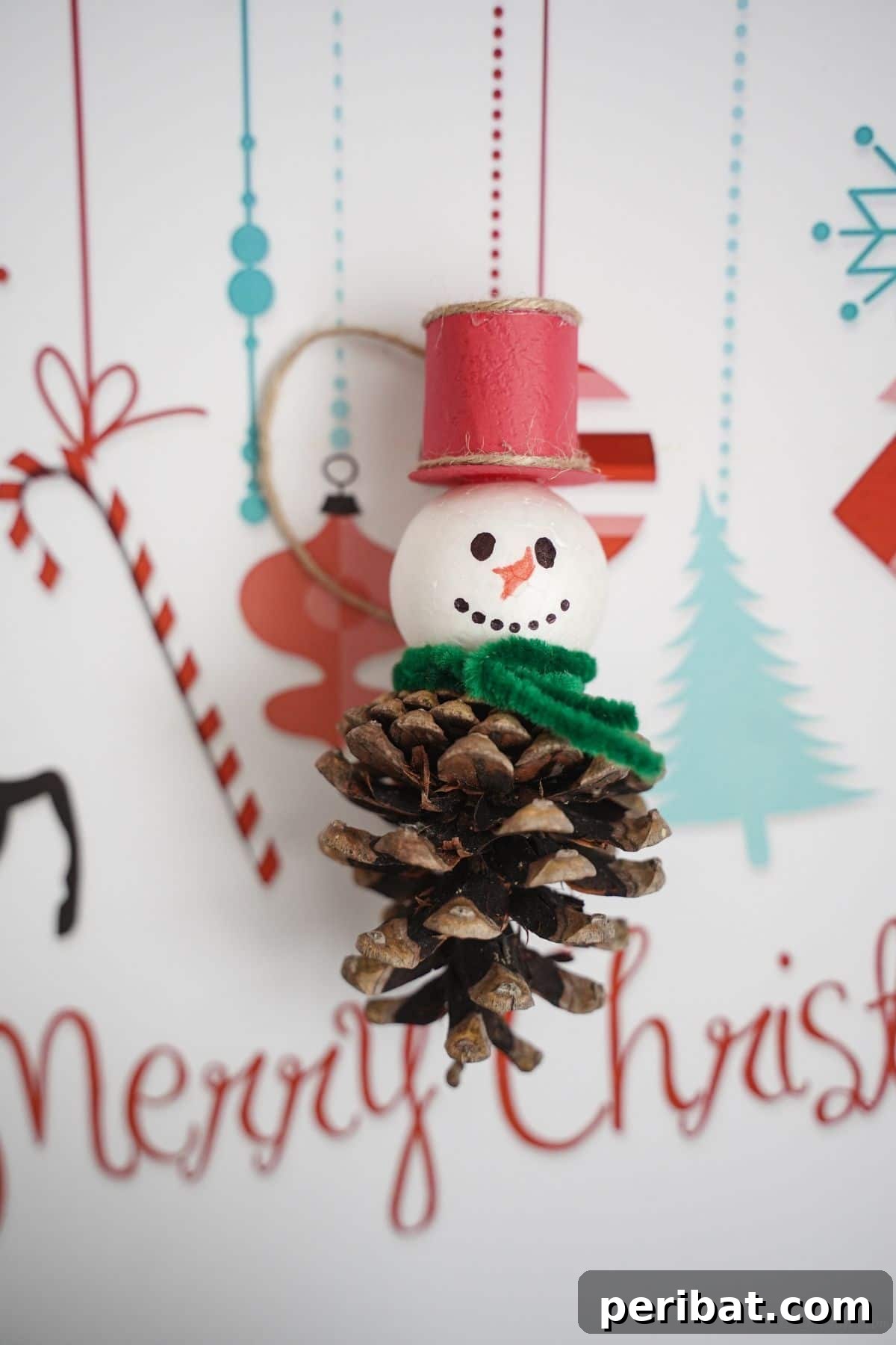 Woodland Pinecone Snowman Charm 6 merry christmas paper behind pinecone snowman