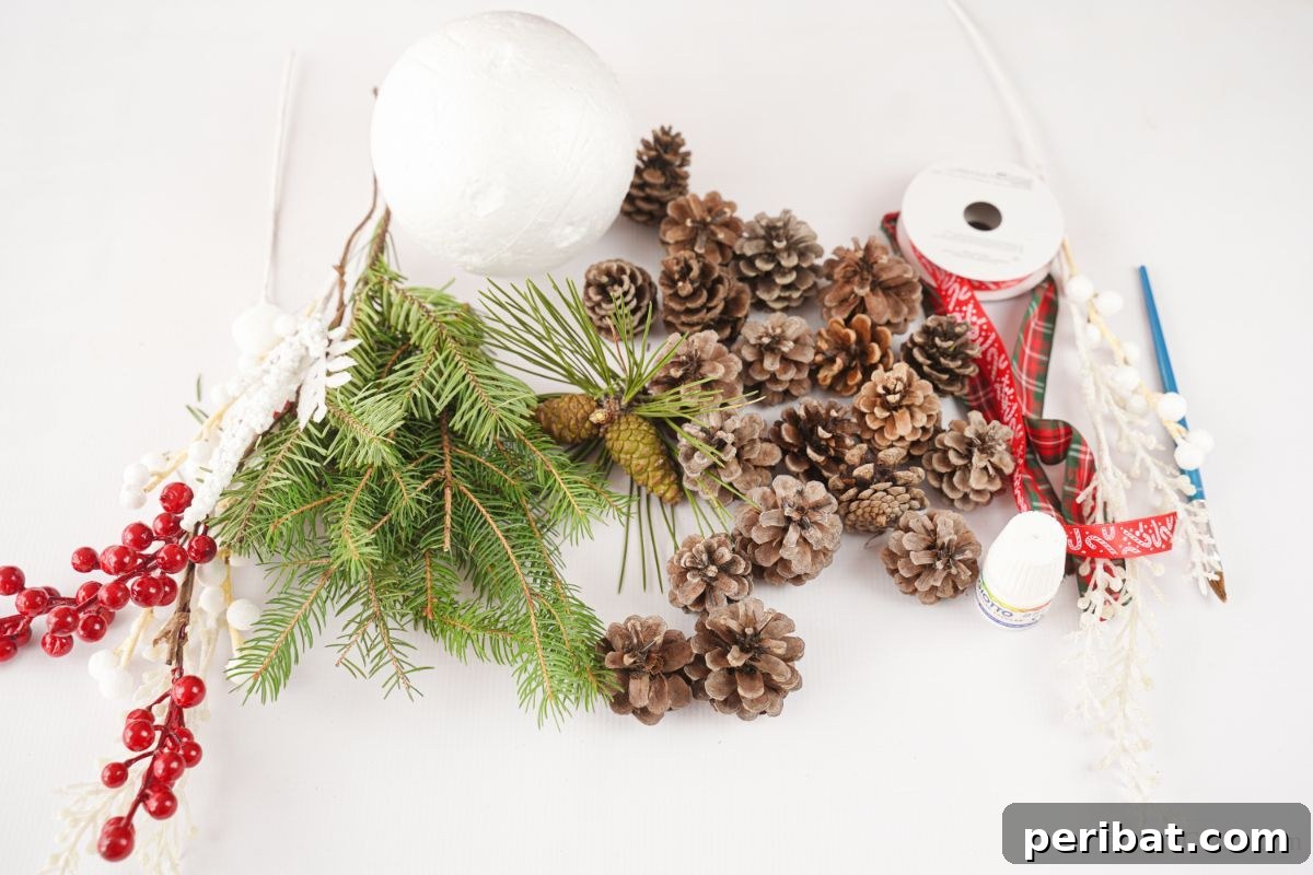 Festive Pinecone Ball Door Ornament 8 Pinecones on a table with ribbon and fake berries, ready for crafting a Christmas door hanger