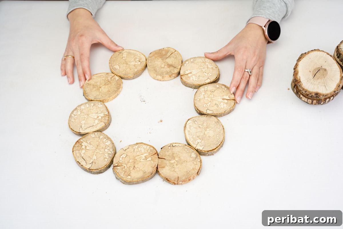 Natural Branch Slice Wreath Adorned with Pinecones 9 Wood slices arranged in a circle, forming the base of the wreath