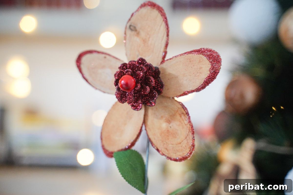 wood slice flower close up in front of tree