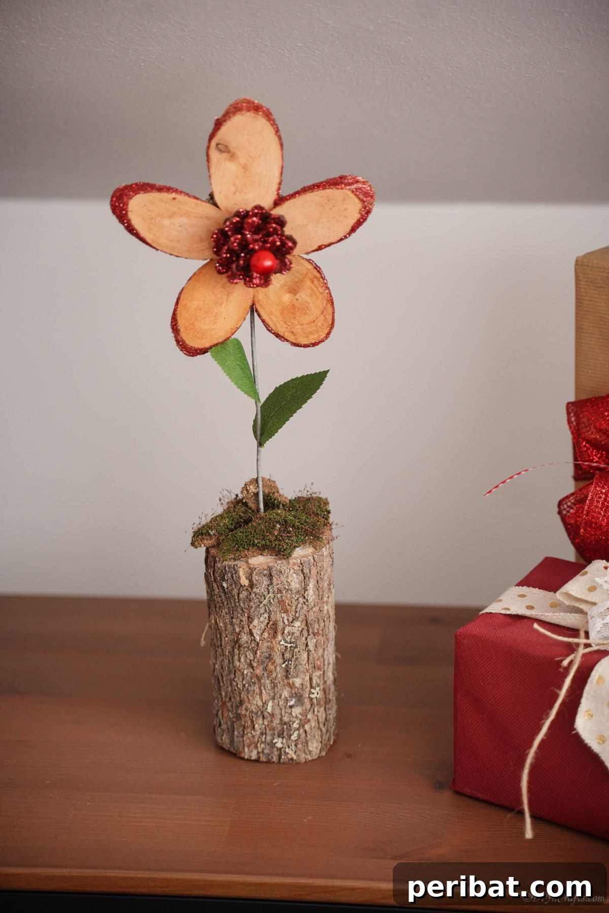 wood slice flower on wood slice sitting on table