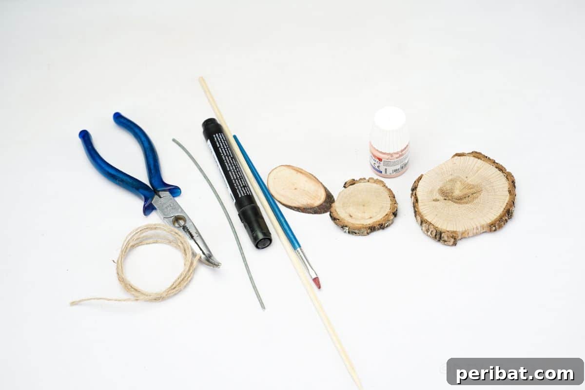 wood slices, marker, and scissors laid out on a white table, ready for crafting