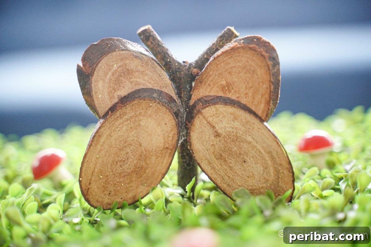 A whimsical wood slice butterfly resting on vibrant green grass, adorned with miniature red mushrooms, creating a charming natural scene