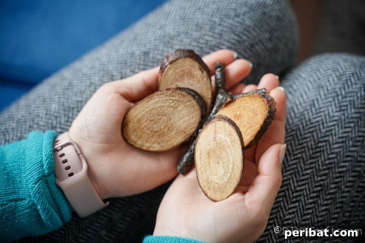 A beautifully crafted wood slice butterfly gently held in hands, showcasing its intricate details and rustic appeal