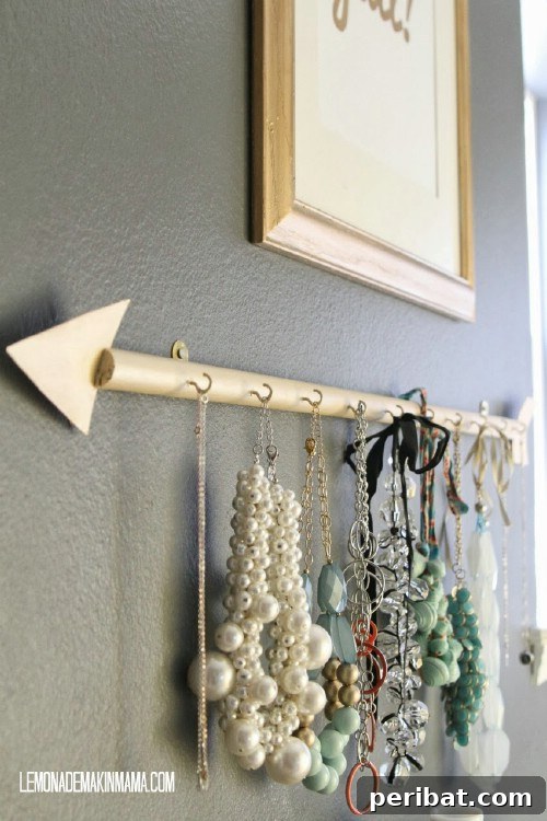 DIY Arrow Jewelry Holder: Chic Bathroom Storage for Necklaces and Bracelets
