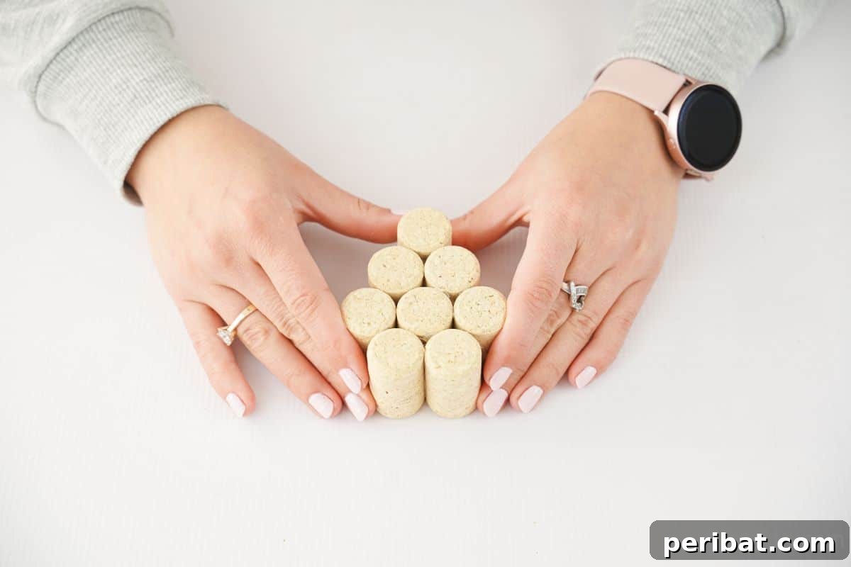corks in grape cluster form on white table
