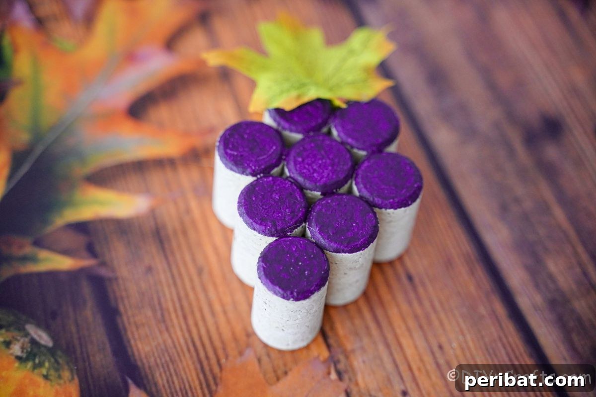 corks made into grape cluster and painted purple on table