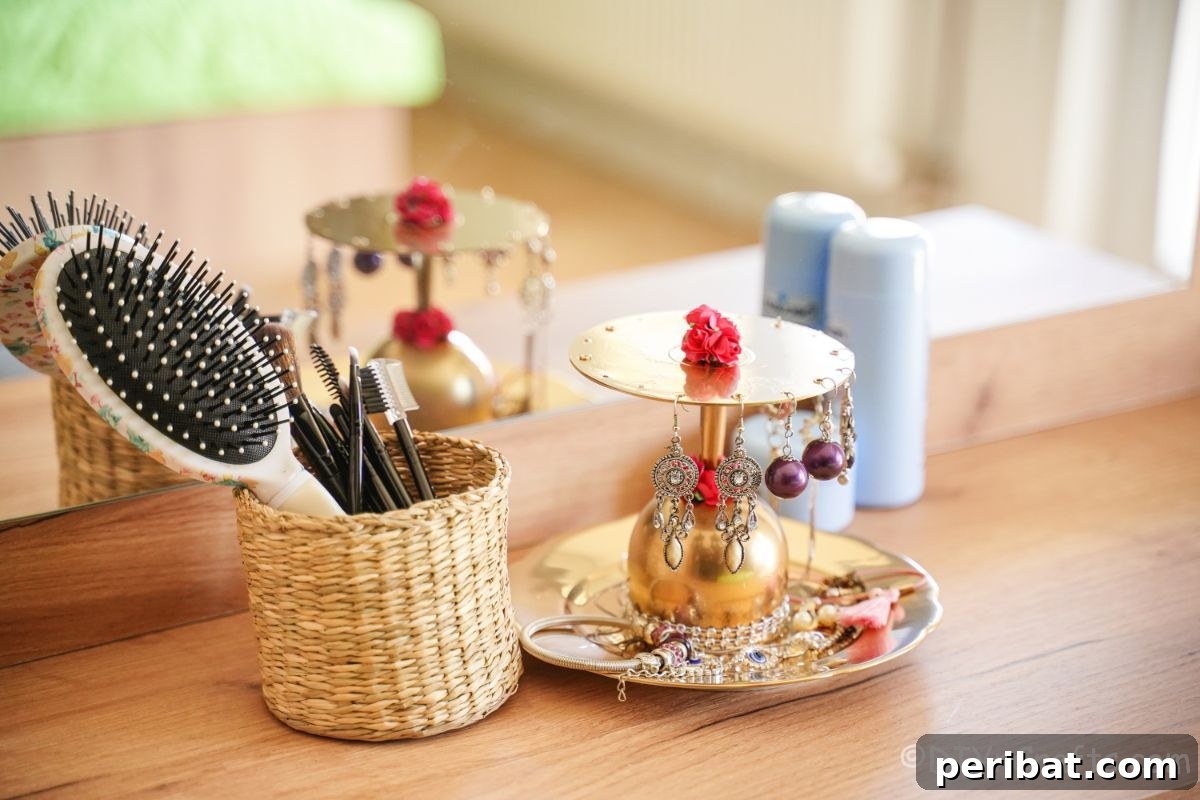 Elegant Repurposed Plate Jewelry Organizer 3 small basket of hair tools beside gold jewelry stand