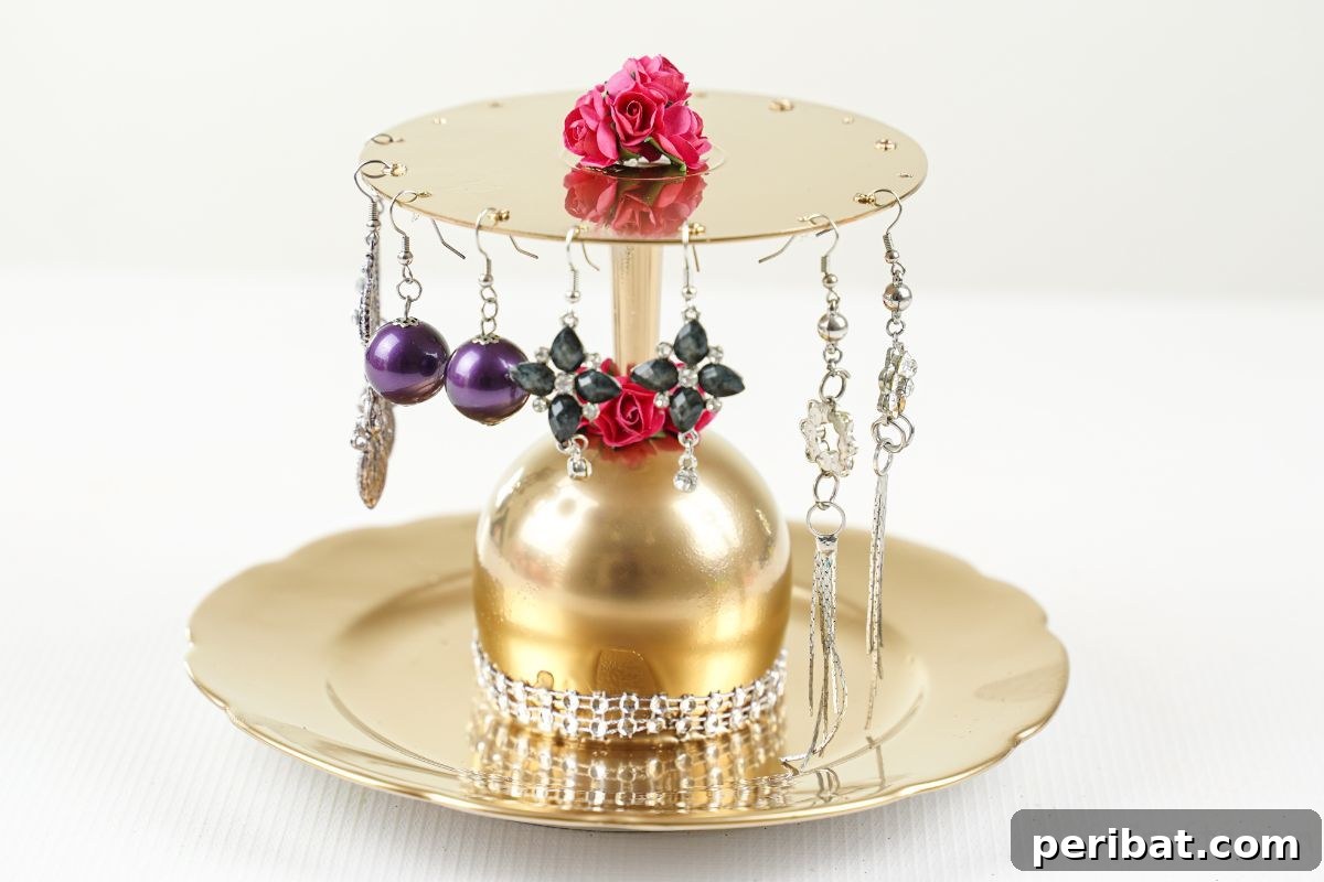 Elegant Repurposed Plate Jewelry Organizer 22 gold painted plate and cd jewelry holder on white table