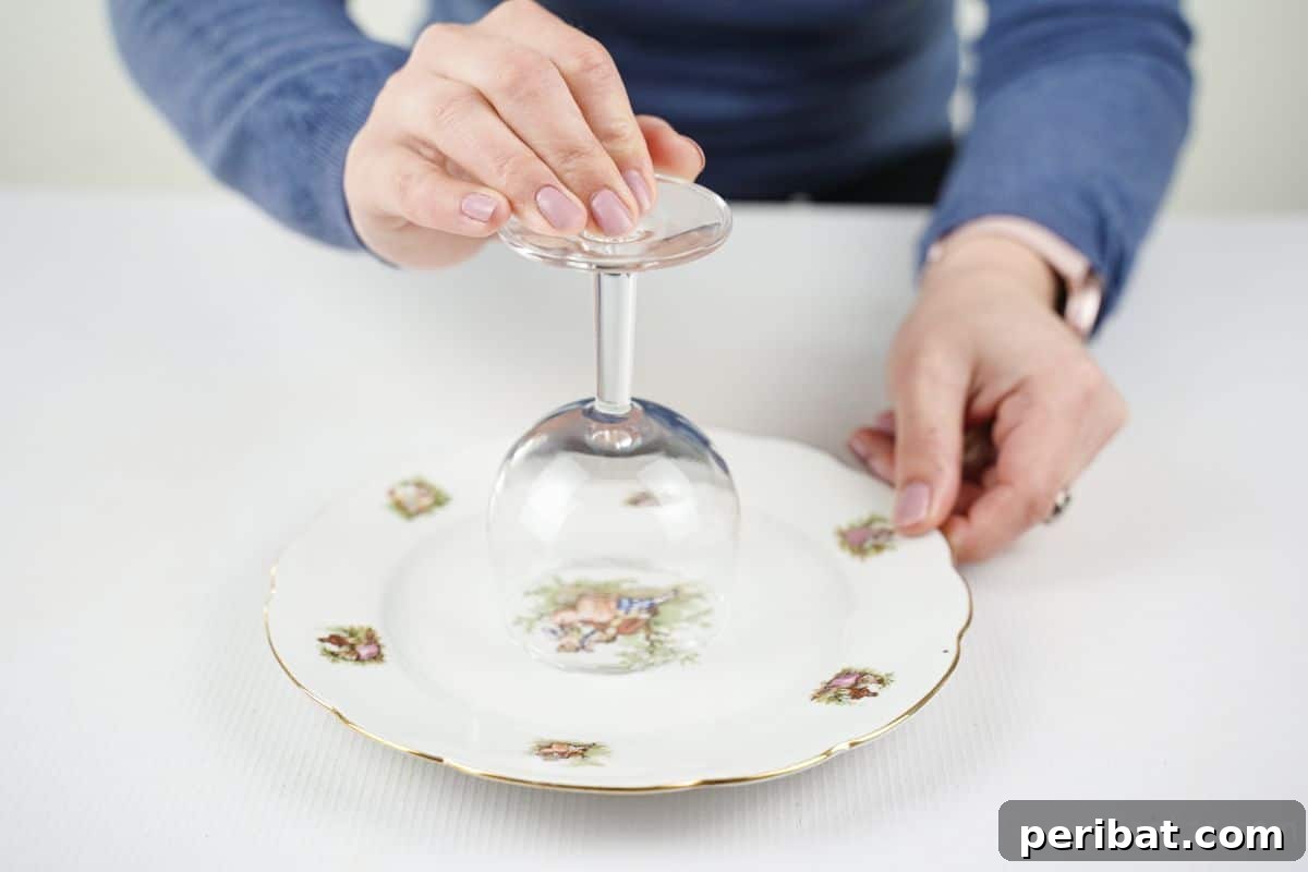Elegant Repurposed Plate Jewelry Organizer 10 hand gluing glass to top of plate