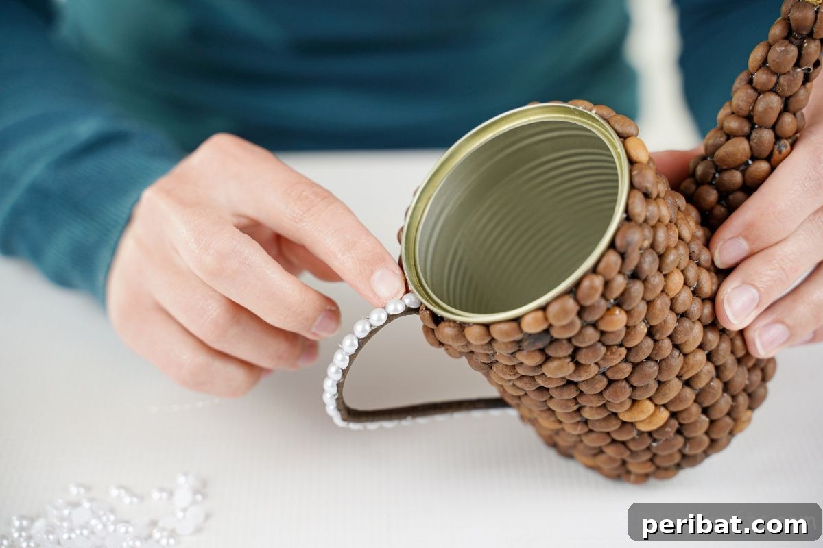 Rustic Coffee Motif Tin Watering Can 20 Hand carefully gluing pearl beads onto the outside edge of the watering can handle as a final embellishment