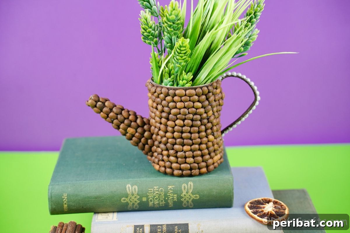 Rustic Coffee Motif Tin Watering Can 3 Rustic upcycled tin can watering can filled with flowers on a stack of books with a purple background