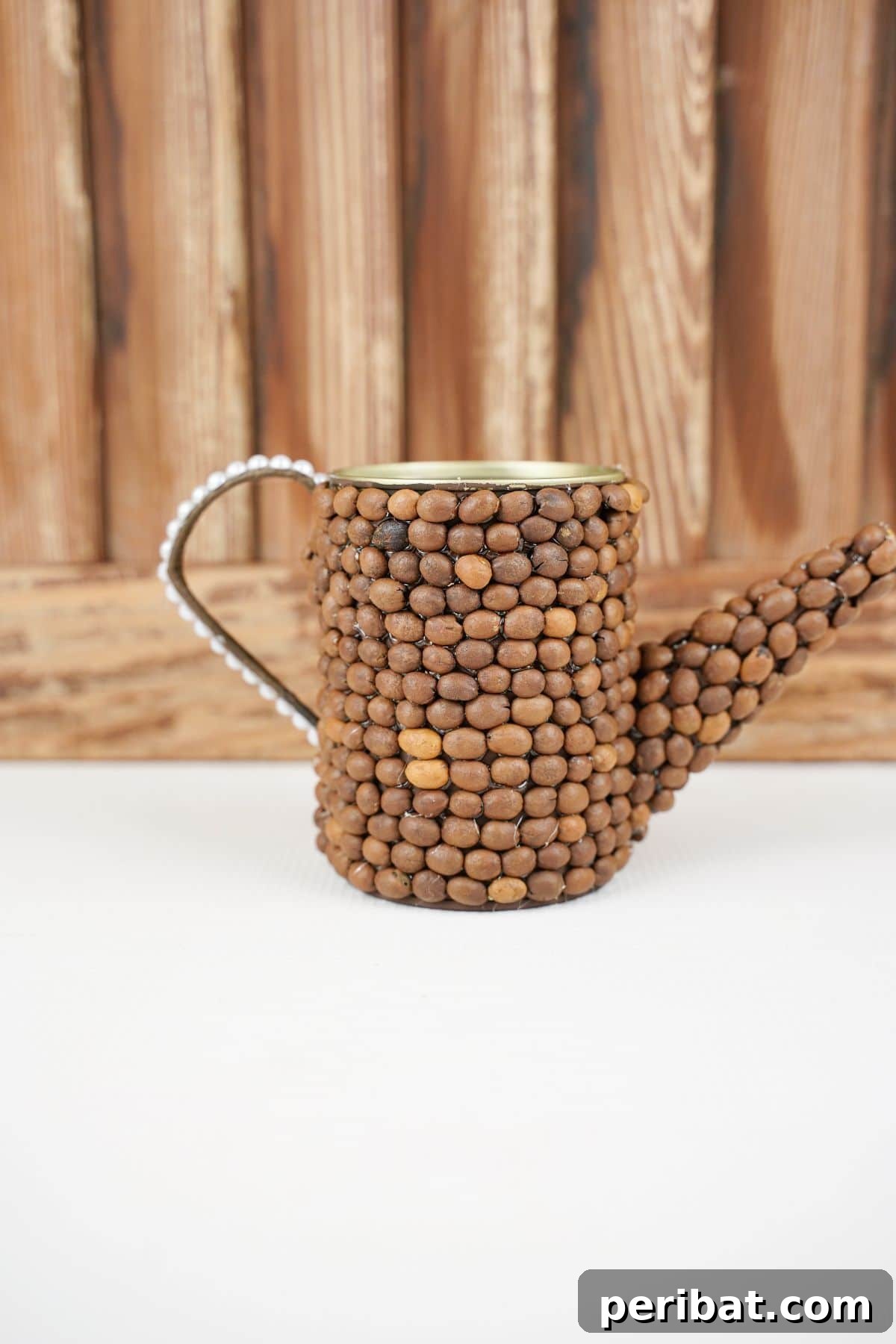 Rustic Coffee Motif Tin Watering Can 24 Rustic garden decor upcycled watering can on a white table with a wood background