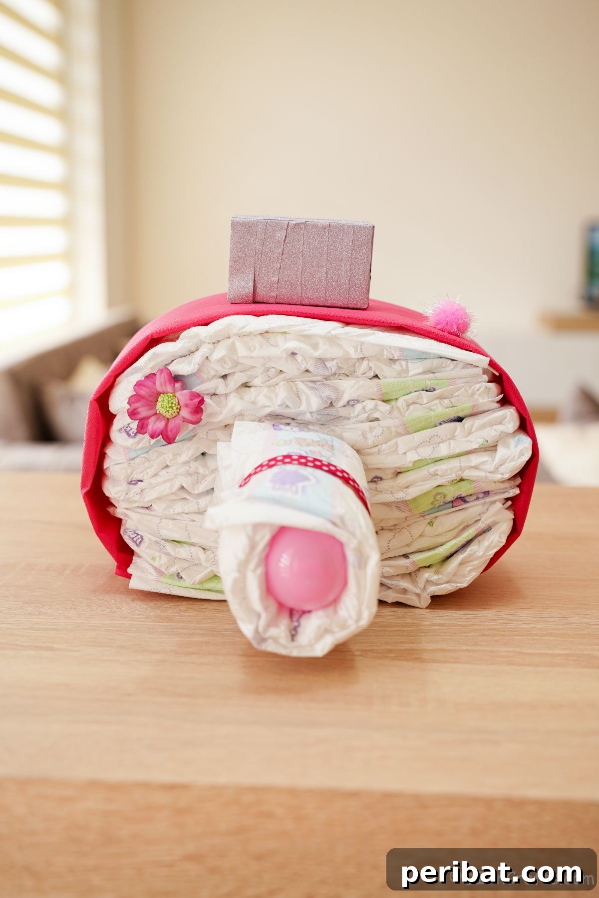 Picture Perfect Diaper Cake Camera 2 Elegant camera diaper cake on rustic wood table, perfect for a photographer's baby shower