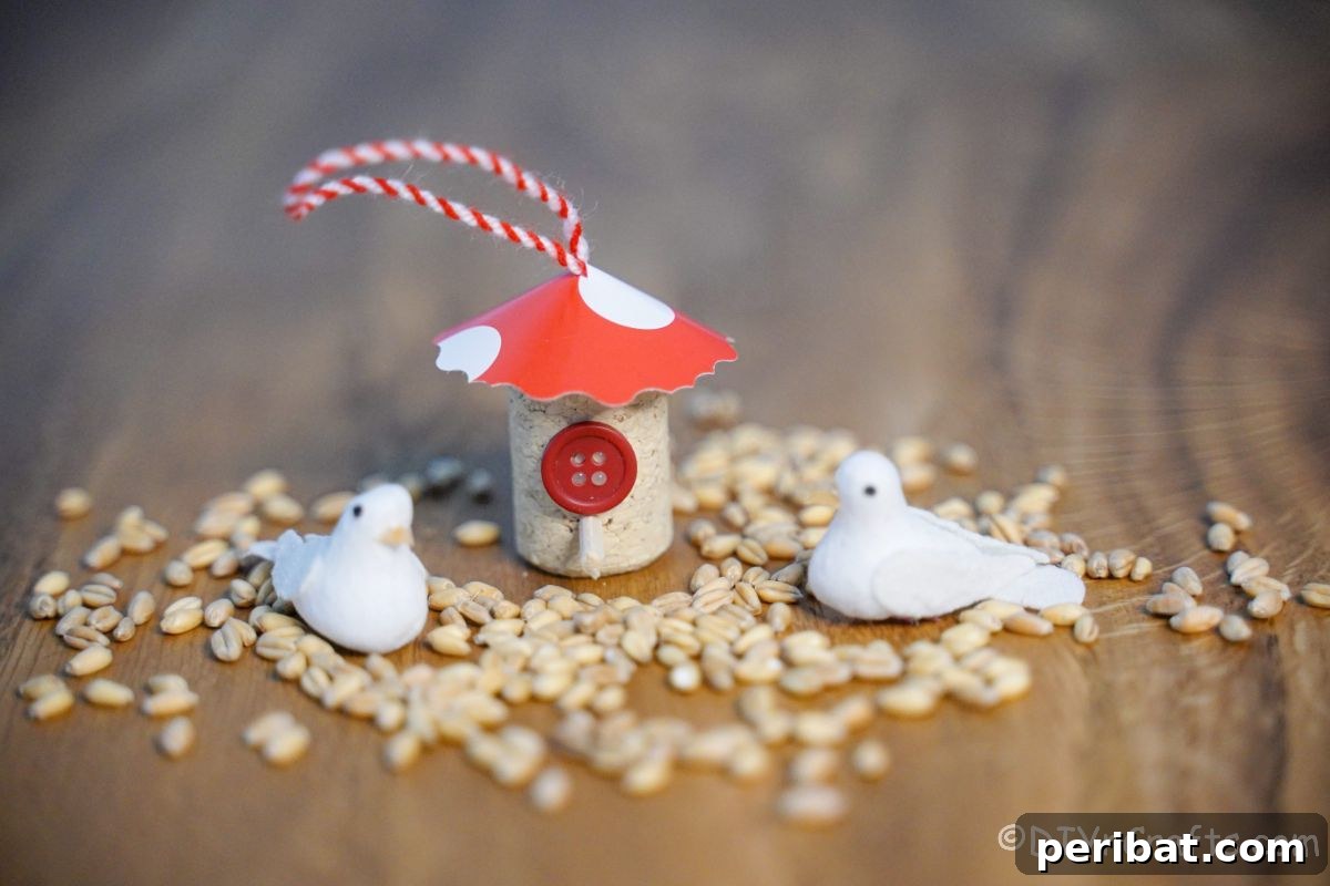 mini birdhouse from wine cork on table