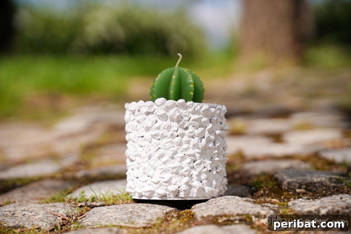 Nature-Inspired Upcycled Tin Can Planters 21 tin can planter painted white on rock drive