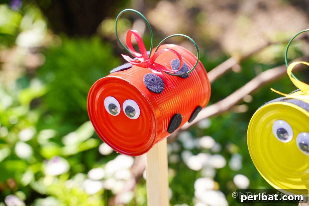 red and black ladybug garden stake by white shrub