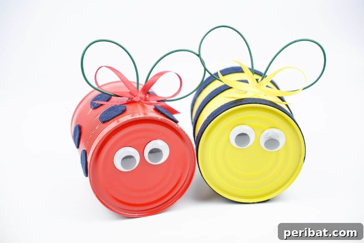 tin can critters bee and ladybug on white table