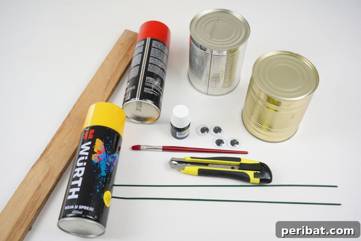 tin cans spray paint and craft supplies on white table