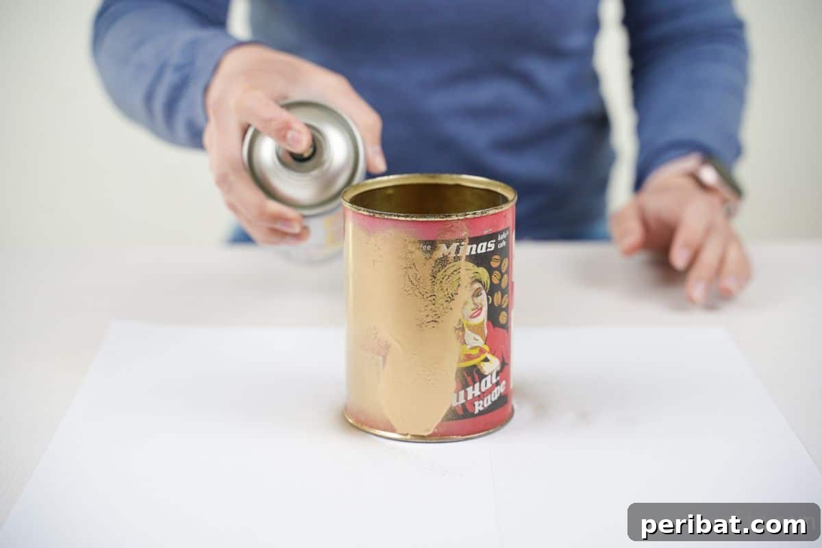 Percussion from the Pantry: Upcycled Tin Can Drums 8 hand spray painting tin can gold
