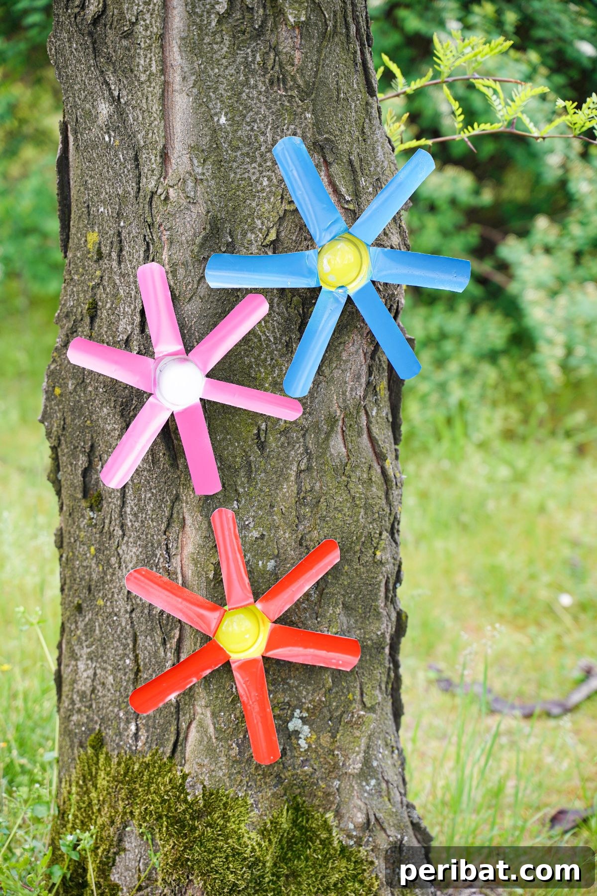 Aluminum Bloom Art 2 pink red and blue metal flowers hanging on tree