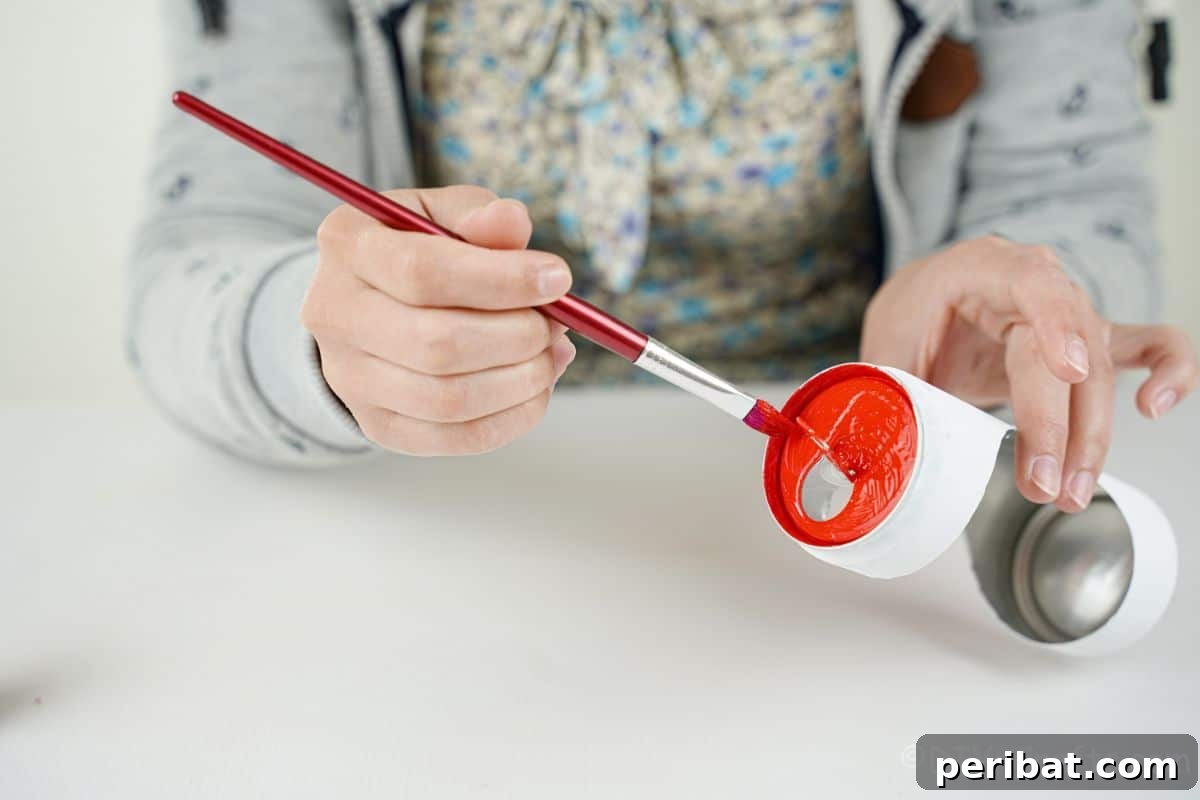 red paint on top of soda can