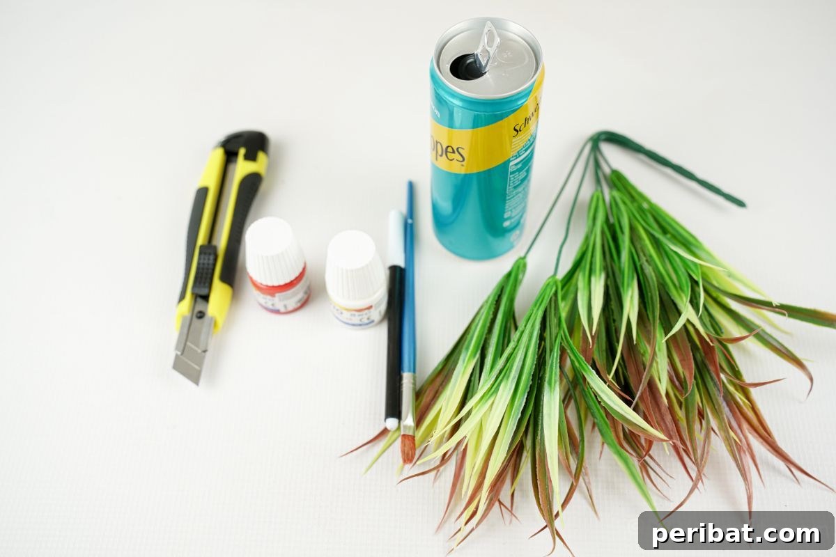 soda can fake greens knife and paint on white table