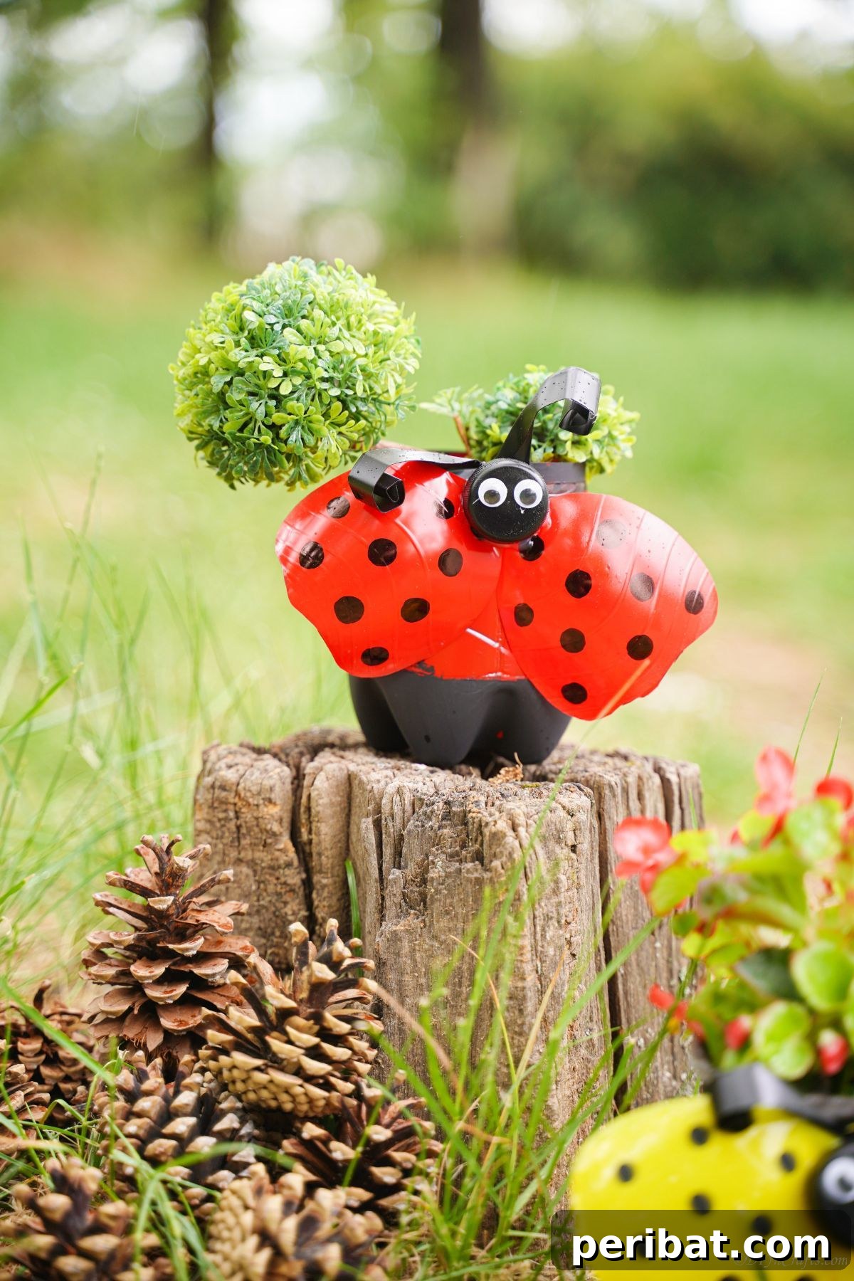 Upcycled Ladybug Garden Gems 4 plastic bottle ladybug planter on stump