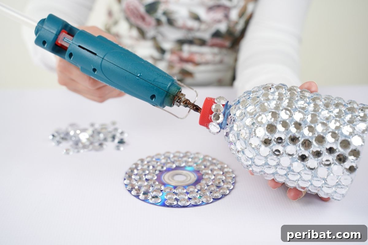 Radiant Recycled Rhinestone Vase 12 blue glue gun being held on lid of bottle