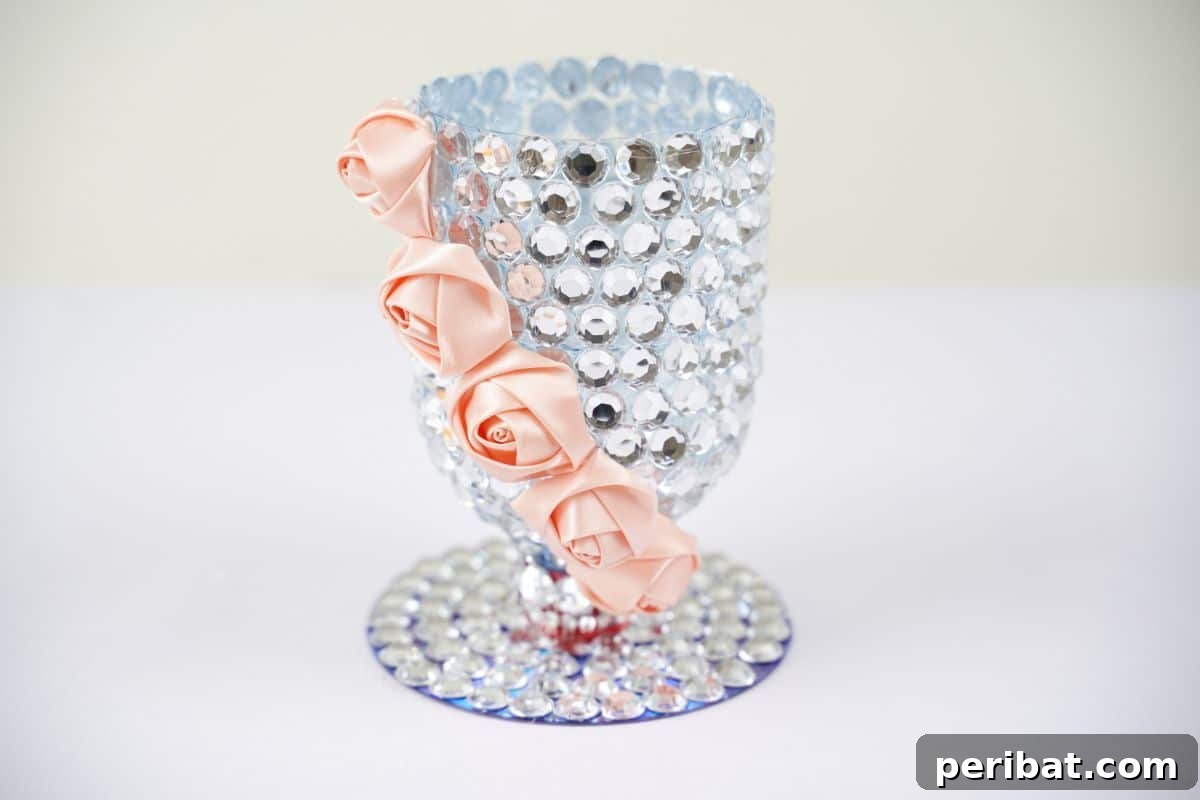Radiant Recycled Rhinestone Vase 19 rhinestone vase with pink flowers on white table