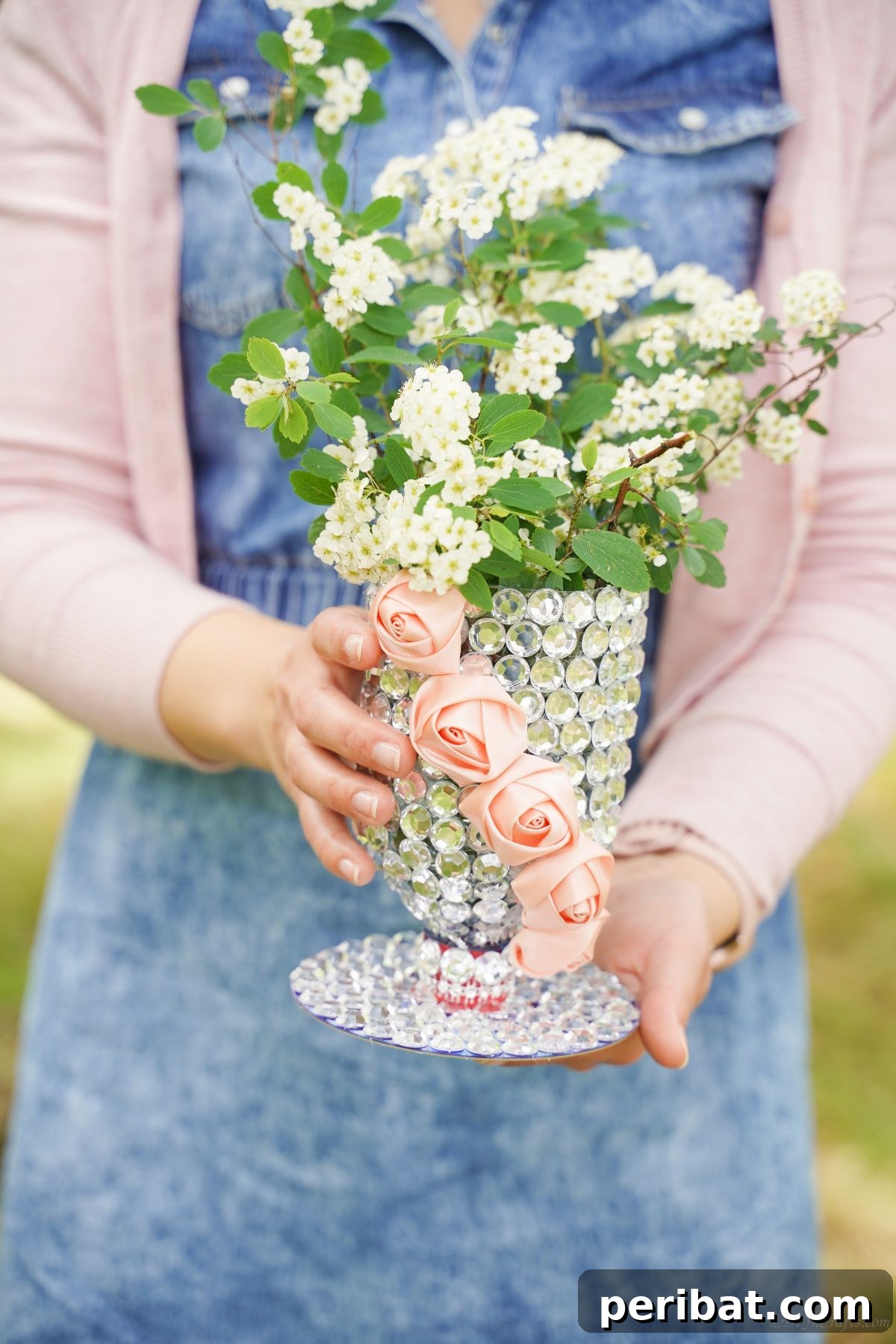 Radiant Recycled Rhinestone Vase 21 lady in denim jumper holding rhinestone covered vase