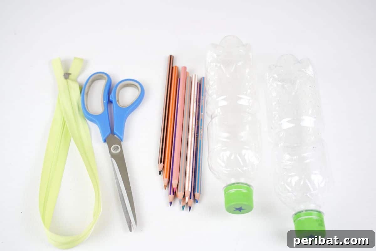Stitch-Free Upcycled Bottle Stationery Pouch 8 Arrangement of crafting supplies: zipper, scissors, pencils, and empty water bottles on a pristine white table.