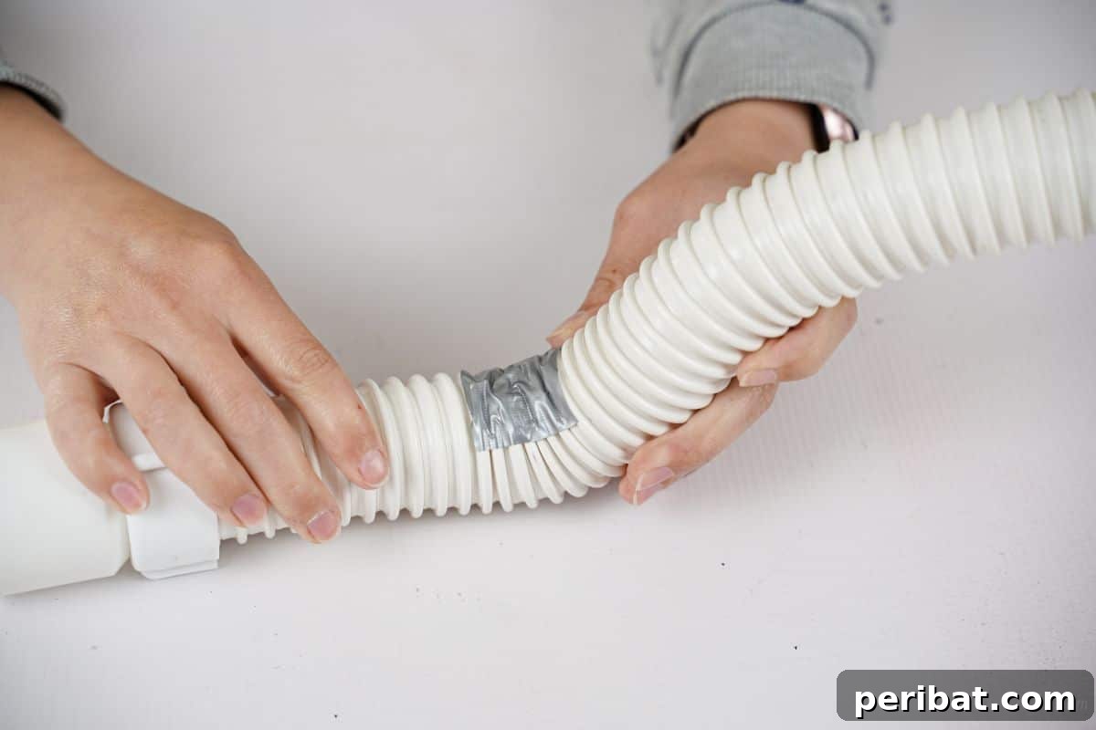 Upcycled Bottles Blossom into Adorable Elephant Planters 14 taping pipe into elephant trunk shape