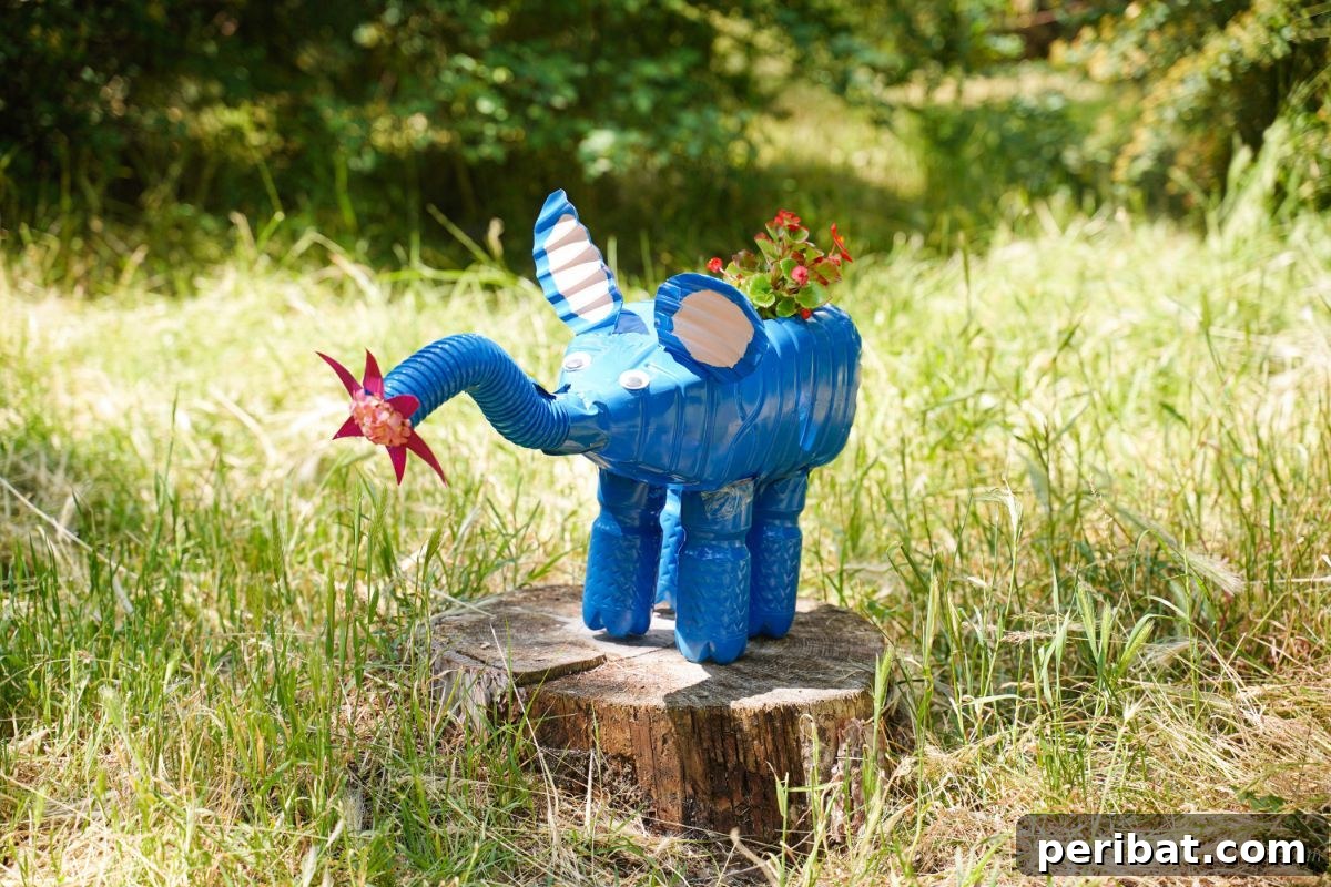 Upcycled Bottles Blossom into Adorable Elephant Planters 21 blue elephant planter on stump