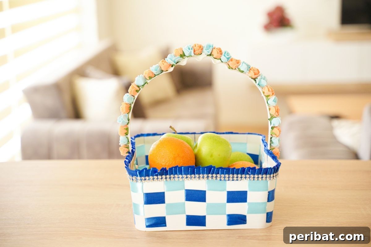 Sweet Treat Pail Transformed Basket 3 White and blue woven basket on a table with fresh fruit inside, highlighting the functionality.