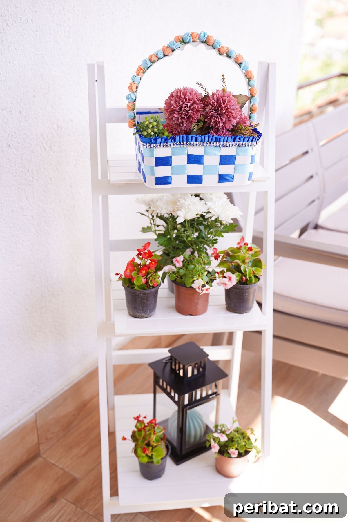 Sweet Treat Pail Transformed Basket 18 White ladder shelf holding planters and a basket of flowers, showing how the basket integrates into home decor.