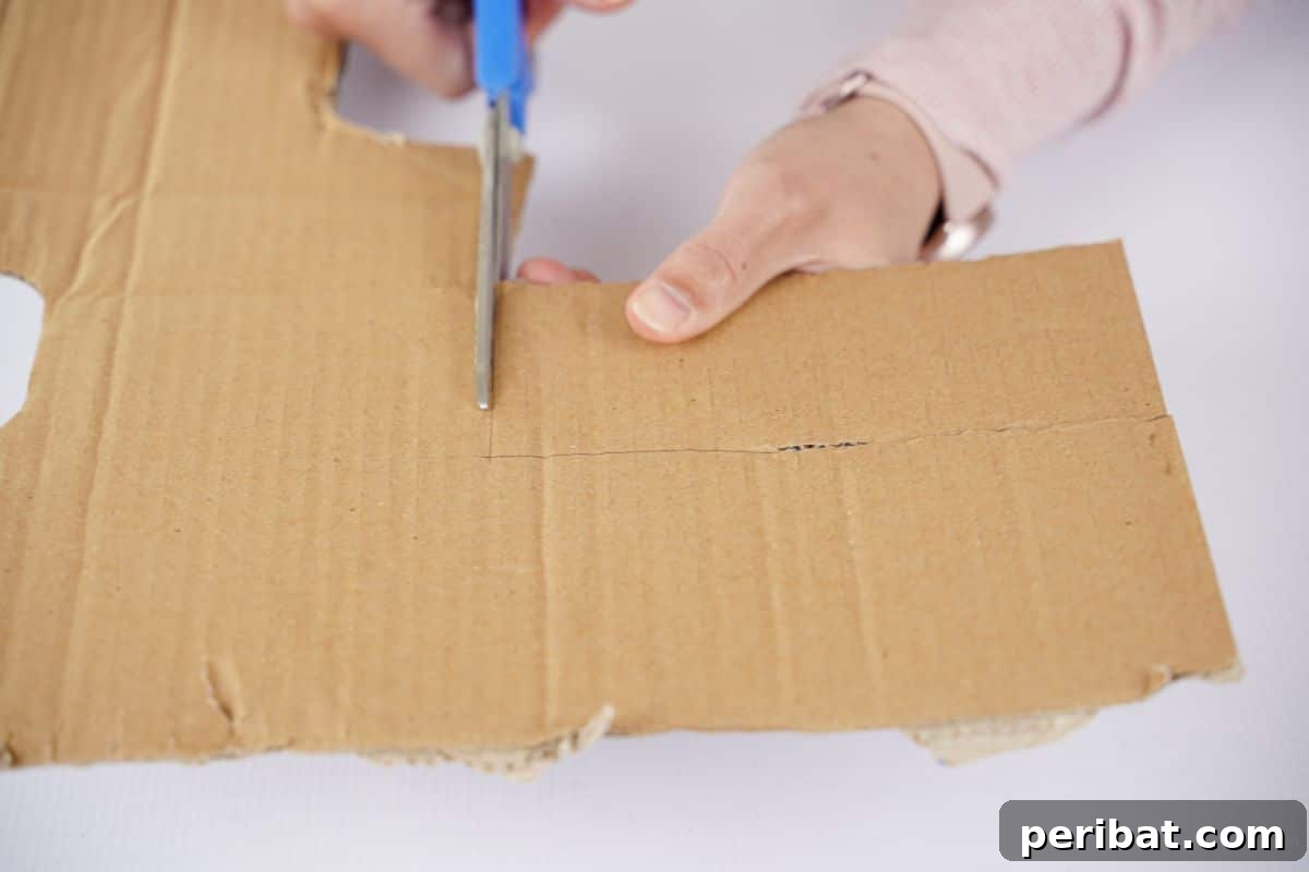 Eco-Chic Bottle Bags: Colorful DIY 13 blue scissors cutting cardboard