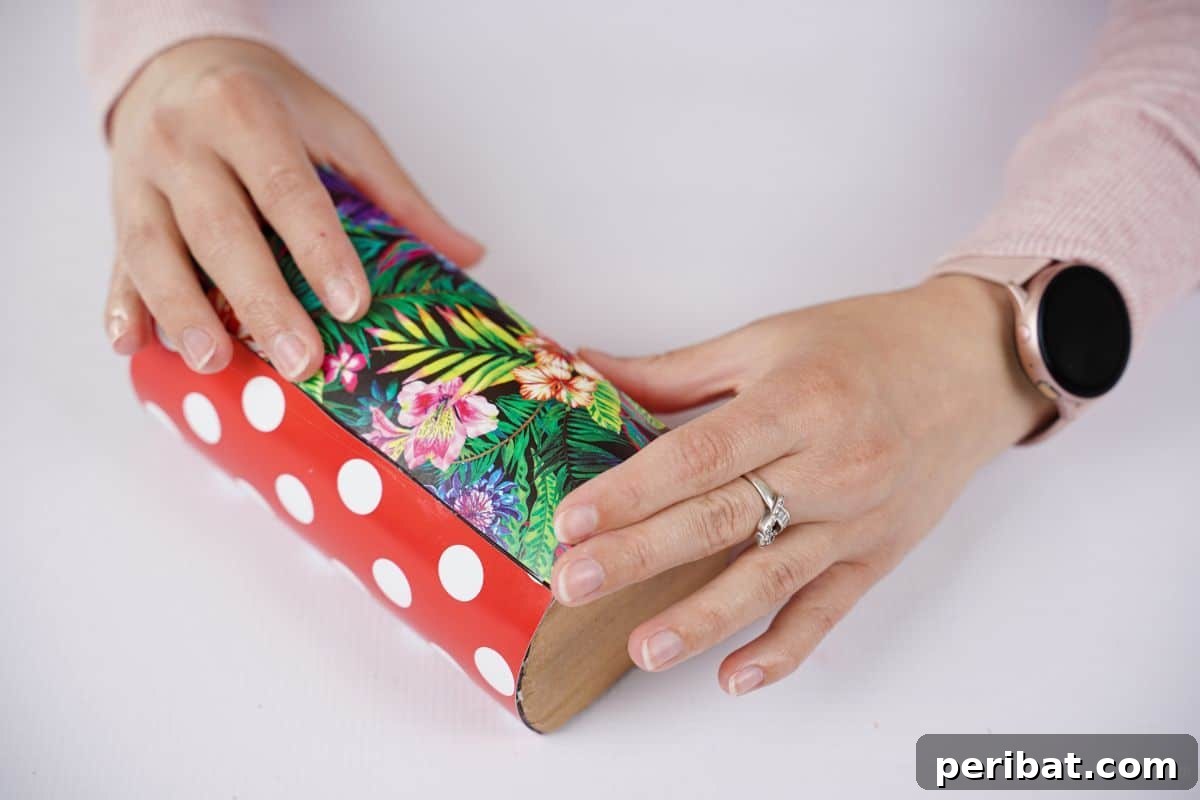 Eco-Chic Bottle Bags: Colorful DIY 17 floral paper being added to purse form