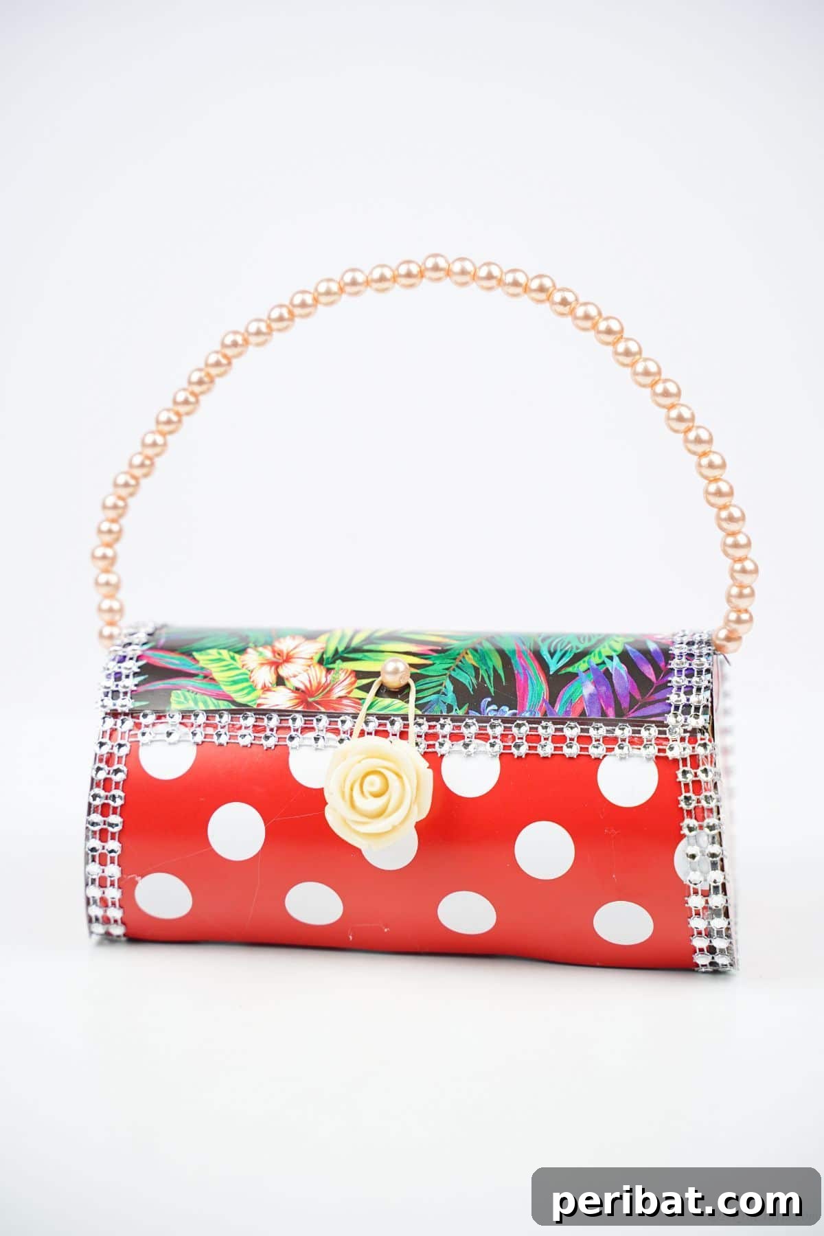 Eco-Chic Bottle Bags: Colorful DIY 25 small purse with red and white cover and pearl handle on white table
