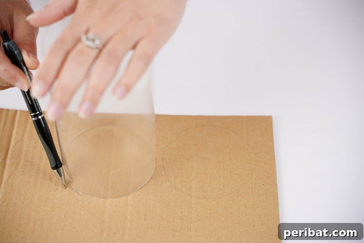 Eco-Chic Bottle Bags: Colorful DIY 10 hand holding plastic to trace onto cardboard