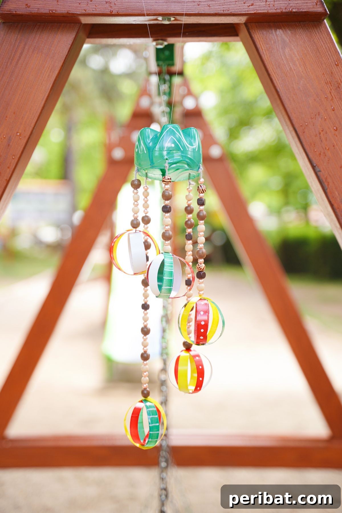Beaded Bottle Breeze Song 6 swing set with wind chime on the end