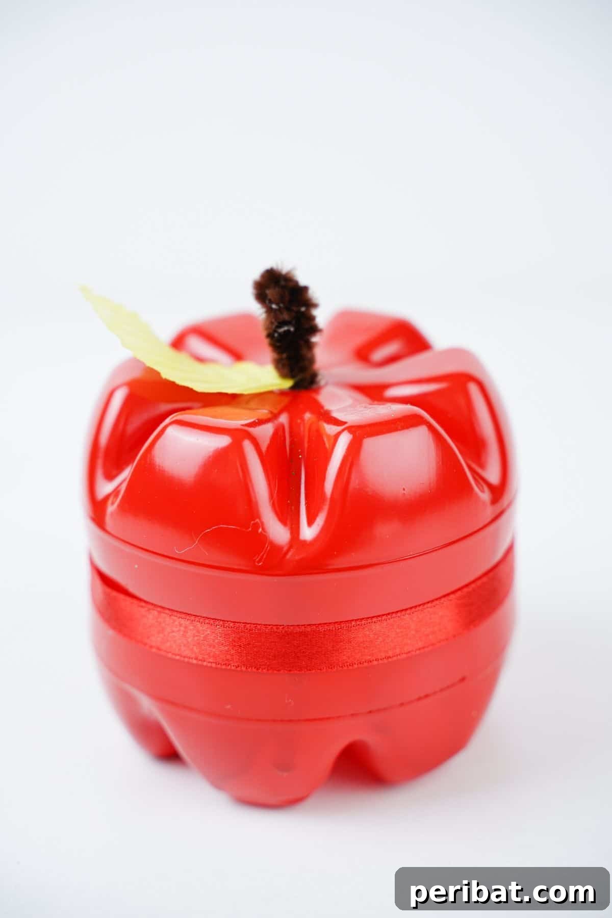 Charming Apple Plastic Bottle Teacher Gift 19 red painted plastic apple on white table