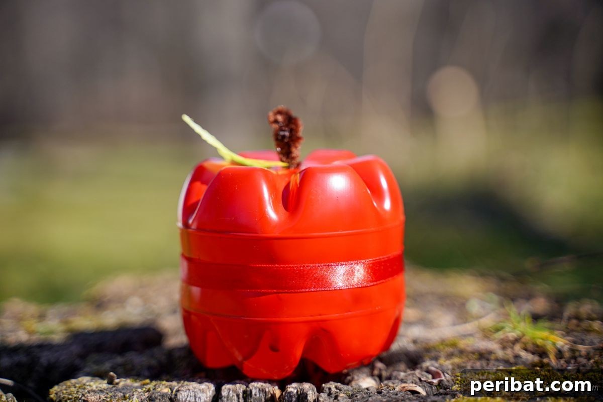 Charming Apple Plastic Bottle Teacher Gift 5 plastic apple on ground outside