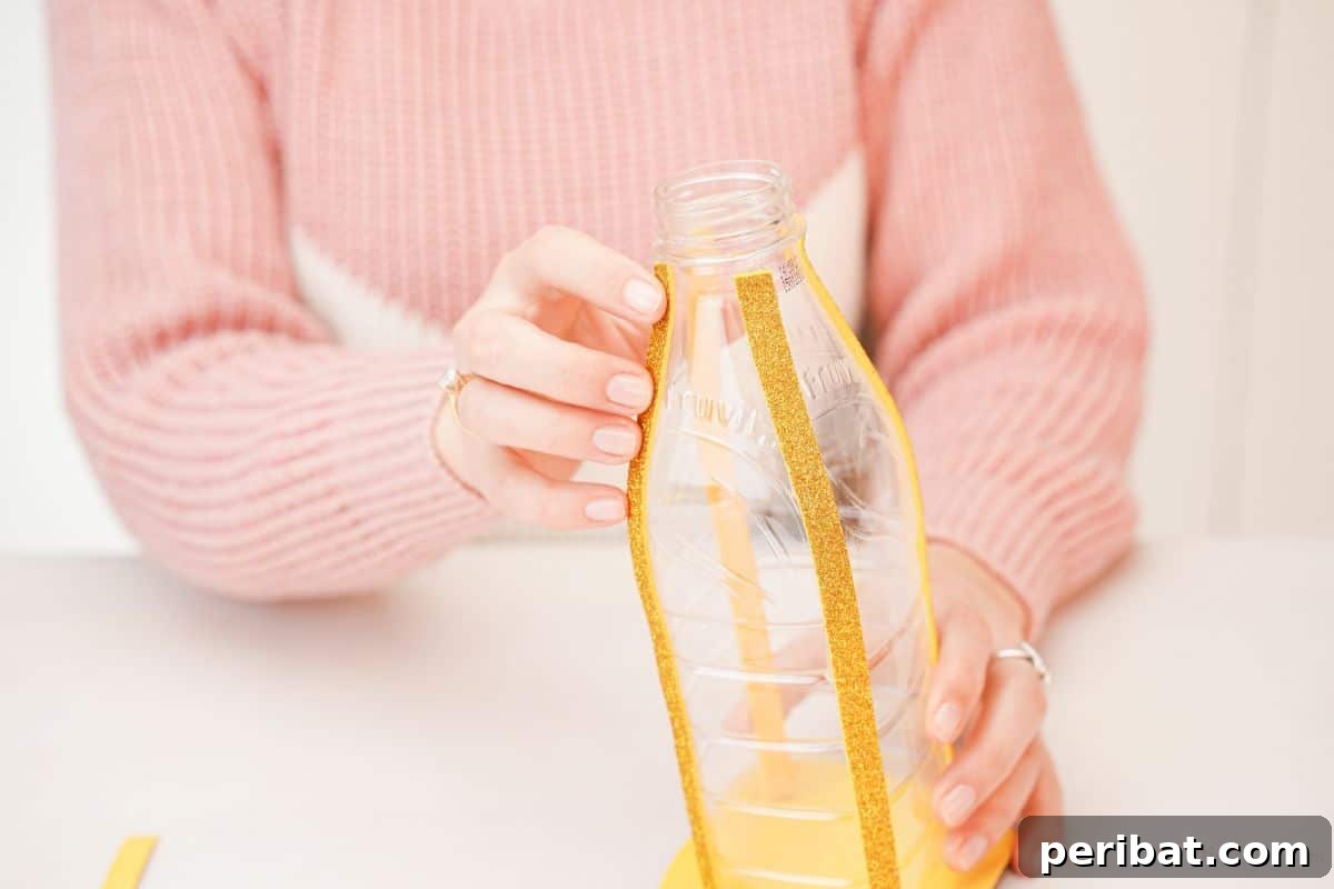 Upcycled Bottle Glow 7 A finished plastic bottle lantern casting a soft glow in a cozy setting.